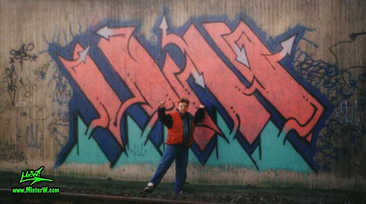 Photo of Werner "Mr.W" Skolimowski in front of his old school graffiti art painting in Hamburg, Germany, 1987. Mr.W & His Graffiti Painting In 1987