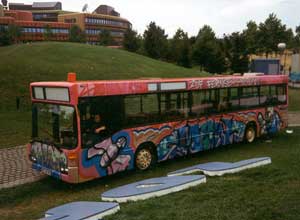 Werner "Mr.W" Skolimowski in a Graffiti Painted Bus