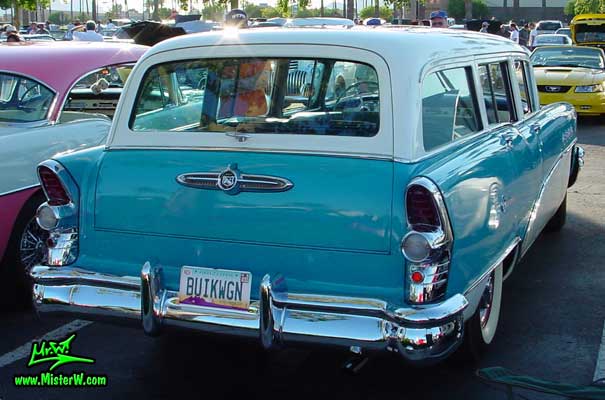 Photo of a turquoise 1955 Buick Stationwagon at the Scottsdale Pavilions Classic Car Show in Arizona. 1955 Buick Stationwagon Rearview
