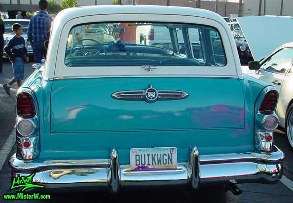 Photo of a turquoise 1955 Buick Stationwagon at the Scottsdale Pavilions Classic Car Show in Arizona. 1955 Buick Stationwagon Back Door