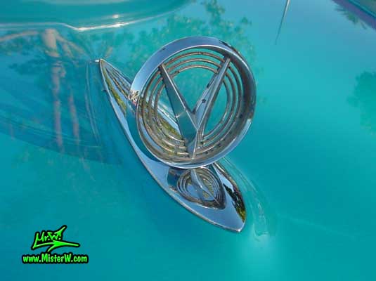 Photo of a turquoise 1955 Buick Stationwagon at the Scottsdale Pavilions Classic Car Show in Arizona. 1955 Buick Stationwagon Hood Ornament