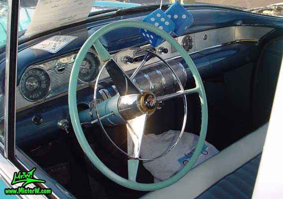 Photo of a turquoise 1955 Buick Stationwagon at the Scottsdale Pavilions Classic Car Show in Arizona. 1955 Buick Stationwagon Dash Board & Interior