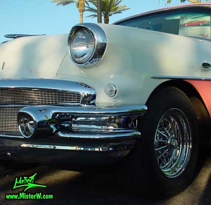 Photo of a white & pink 1956 Buick 2 Door Hardtop Coupe at the Scottsdale Pavilions Classic Car Show in Arizona. 1956 Buick Coupe