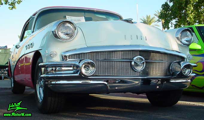 Photo of a white & pink 1956 Buick 2 Door Hardtop Coupe at the Scottsdale Pavilions Classic Car Show in Arizona. 1956 Buick 2 Door