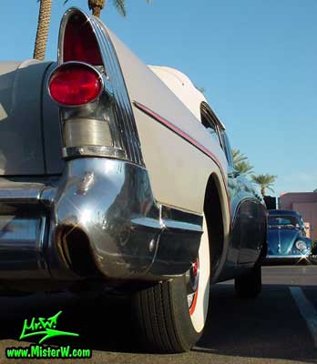 Photo of a grey 1957 Buick Convertible at the Scottsdale Pavilions Classic Car Show in Arizona. 1957 Buick Rear Bumper Corner