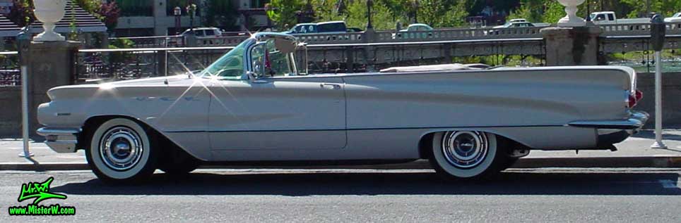 Photo of a white 1960 Buick Invicta Convertible in Reno, Nevada. 1960 Buick Invicta Convertible with the top down