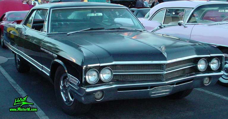 Photo of a black 1965 Buick Electra 2 Door Hardtop Coupe at the Scottsdale Pavilions Classic Car Show in Arizona. 1965 Buick Electra Coupe