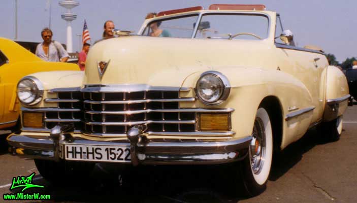 Photo of a cream colored 1947 Cadillac Series 62 Convertible at the Wheels Nationals classic car meeting in Hamburg, Germany. 1947 Cadillac Series 62 Convertible