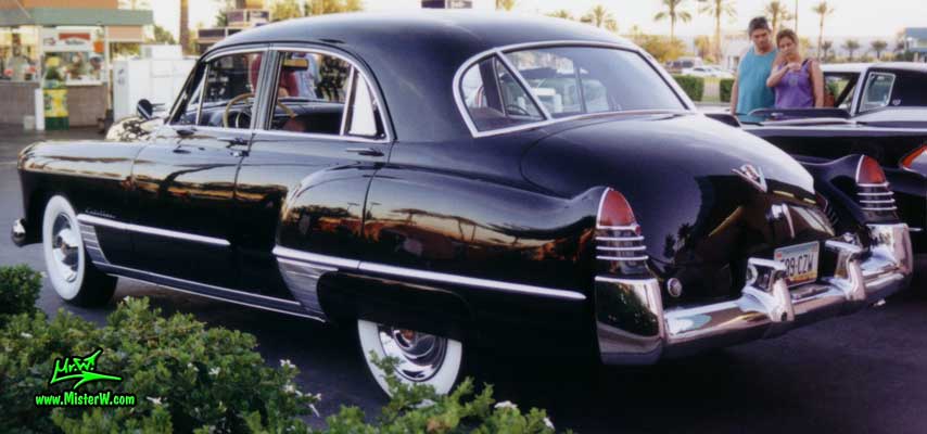 Photo of a black 1948 Cadillac Series 62 Sedan 4 Door Hardtop at the Scottsdale Pavilions Classic Car Show in Arizona. Black 1948 Cadillac Sedan