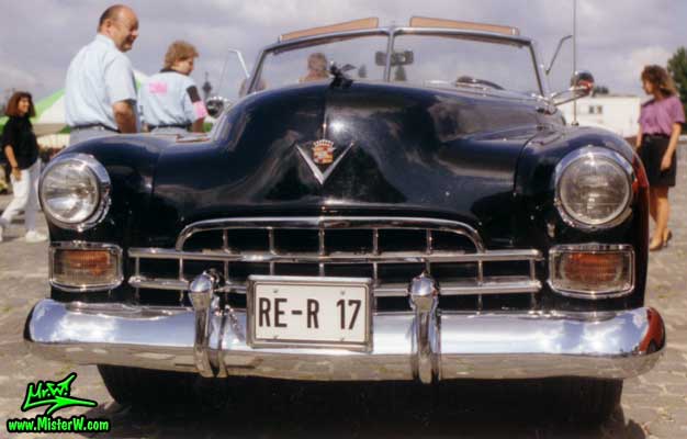 Photo of a black 1948 Cadillac Series 62 Convertible at a classic car meeting in Germany. 1948 Cadillac Series 62 Convertible