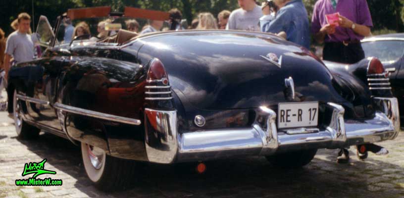 Photo of a black 1948 Cadillac Series 62 Convertible at a classic car meeting in Germany. Black 1948 Cadillac Convertible