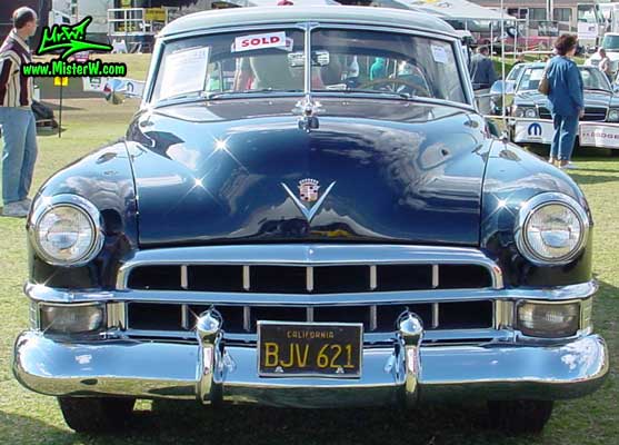 Photo of a midnight blue 1949 Cadillac Series 62 Coupe De Ville 2 door hardtop at a classic car auction in Scottsdale, Arizona. 1949 Cadillac chrome front grill