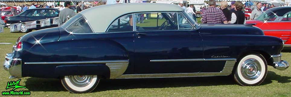 Photo of a midnight blue 1949 Cadillac Series 62 Coupe De Ville 2 door hardtop at a classic car auction in Scottsdale, Arizona. 1949 Cadillac coupe side view