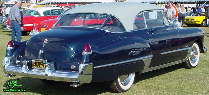 Photo of a midnight blue 1949 Cadillac Series 62 Coupe De Ville 2 door hardtop at a classic car auction in Scottsdale, Arizona. 1949 Cadillac De Ville rear fins