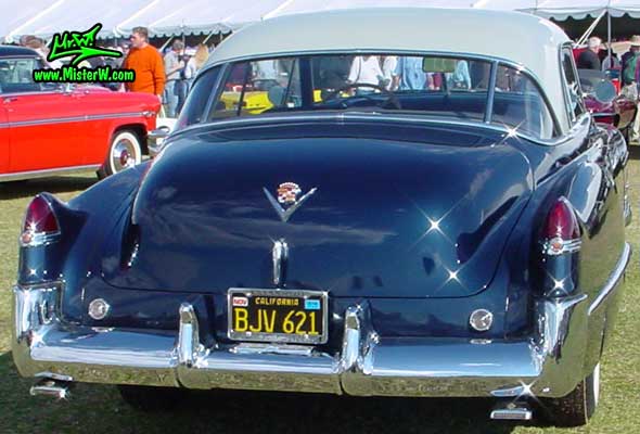 Photo of a midnight blue 1949 Cadillac Series 62 Coupe De Ville 2 door hardtop at a classic car auction in Scottsdale, Arizona. 1949 Cadillac rearview