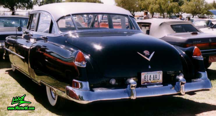 Photo of a black 1950 Cadillac Fleetwood Series Sixty Special Sedan 4 Door Hardtop at a classic car auction in Arizona. 1950 Cadillac Fleetwood Sixty Special Tail Fins