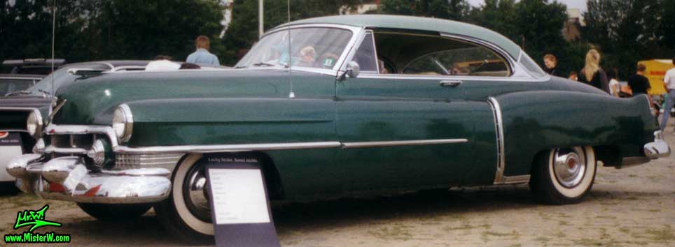 Photo of a forest green 1951 Cadillac Series 62 2 door hardtop coupe at a classic car meeting in Germany. 1951 Cadillac Series 62 hardtop coupe