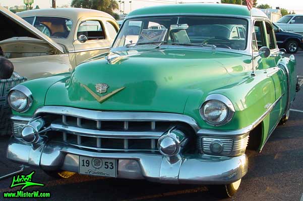 Photo of a turquoise 1953 Cadillac Series 62 Sedan 4 Door Hardtop at a classic car meeting in Phoenix, Arizona. Turquoise 1953 Cadillac