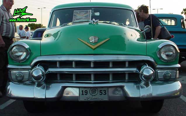Chrome Front Grill of a Turquoise 1953 Cadillac