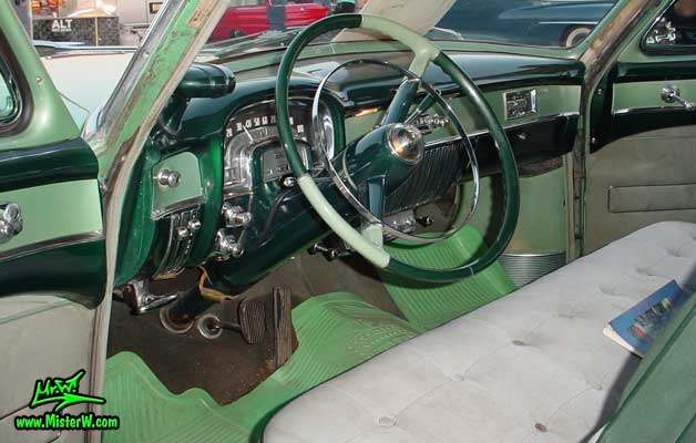 Photo of the interior & dashboard of a turquoise 1953 Cadillac Series 62 Sedan 4 Door Hardtop at a classic car meeting in Phoenix, Arizona. 1953 Cadillac Interior & Dash Board