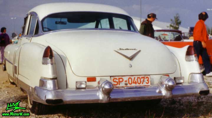 Photo of a white 1953 Cadillac Fleetwood Series Sixty Special Sedan 4 Door Hardtop at a classic car meeting in Germany. 1953 Cadillac Fleetwood Sixty Special Tail Fins