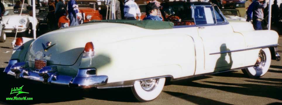 Photo of a white 1953 Cadillac Series 62 Convertible at a classic car auction in Scottsdale, Arizona. 1953 Cadillac Convertible with the top down