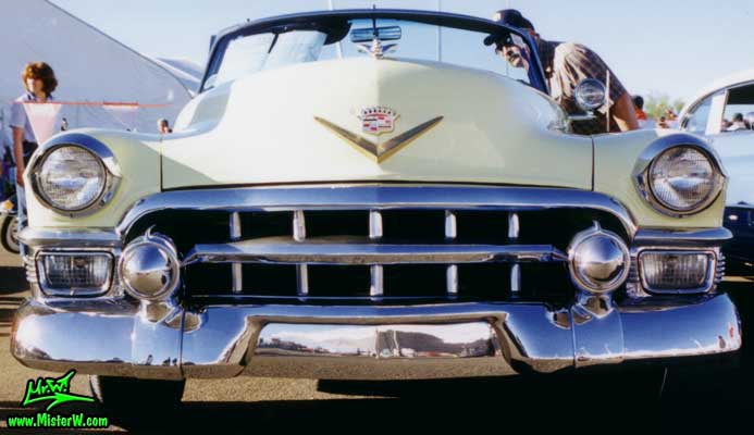 Photo of a white 1953 Cadillac Series 62 Convertible at a classic car auction in Scottsdale, Arizona. Chrome Grill of a 1953 Cadillac