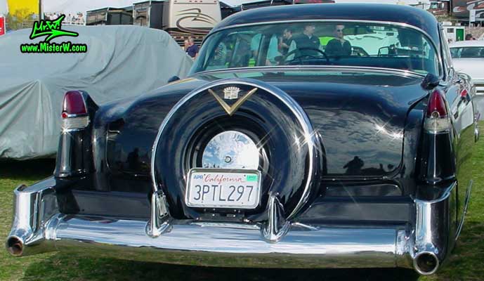 Photo of a black 1954 Cadillac Coupe DeVille 2 Door Hardtop at a classic car auction in Scottsdale, Arizona. 1954 Cadillac Coupe DeVille with Continental Kit