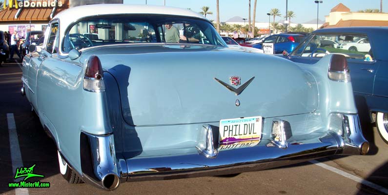 Photo of a blue 1954 Cadillac Coupe DeVille 2 Door Hardtop at the Scottsdale Pavilions Classic Car Show in Arizona. Rearview of a 1954 Cadillac Coupe DeVille 2 Door Hardtop