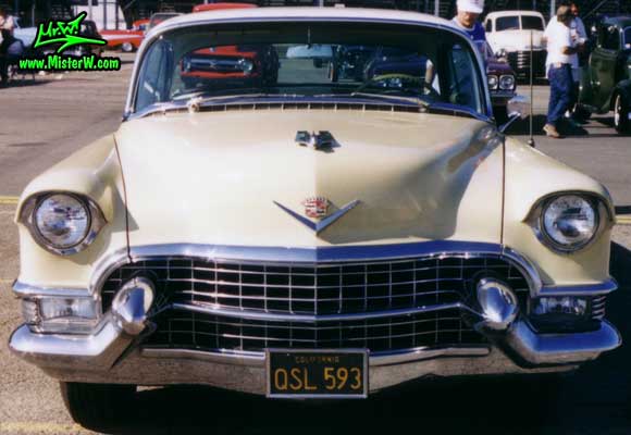 Photo of a cream colored 1955 Cadillac Coupe 2 Door Hardtop at the Pomona Classic Car Swap Meet in Los Angeles, California. 1955 Cadillac Coupe 2 Door Hardtop
