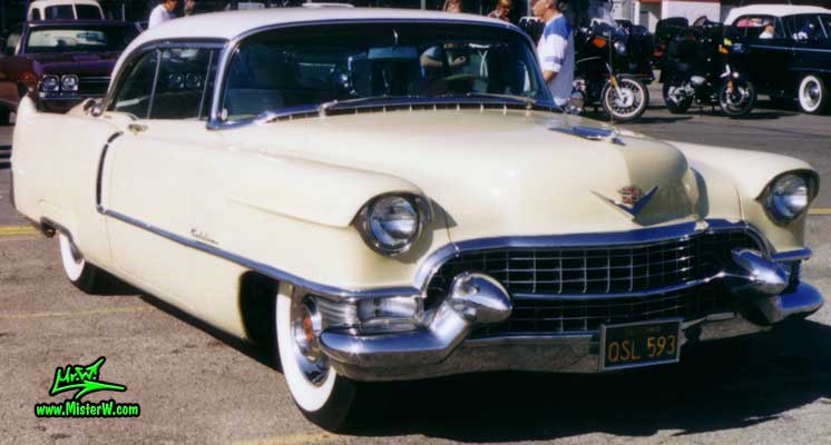 Photo of a cream colored 1955 Cadillac Coupe 2 Door Hardtop at the Pomona Classic Car Swap Meet in Los Angeles, California. 1955 Cadillac Coupe