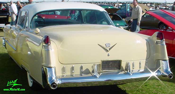 Photo of a cream colored 1955 Cadillac Coupe 2 Door Hardtop at a classic car auction in Scottsdale, Arizona. 1955 Cadillac Coupe at classic car auction