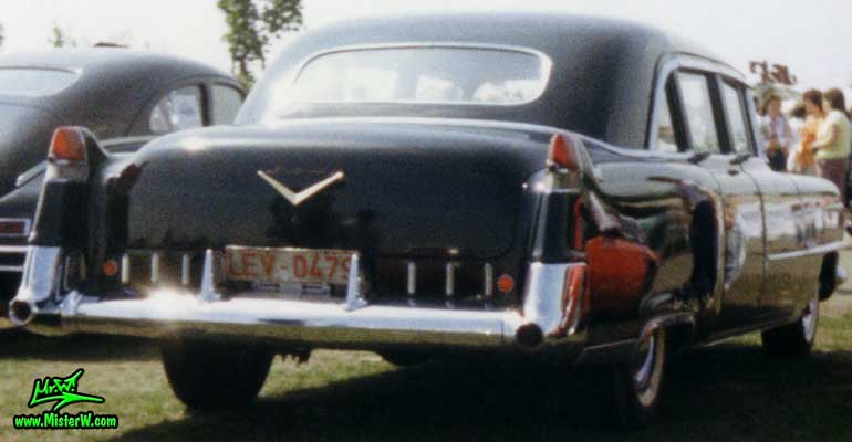 Photo of a black 1955 Cadillac Fleetwood Series 75 Limousine at a classic car meeting in K�ln Chorweiler (Cologne), Germany. Black 1955 Cadillac Fleetwood