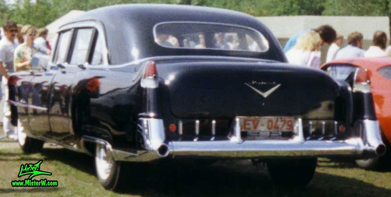 Photo of a black 1955 Cadillac Fleetwood Series 75 Limousine at a classic car meeting in K�ln Chorweiler (Cologne), Germany. 1955 Cadillac Fleetwood Limousine in black