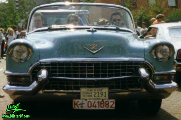 Photo of a turquoise 1955 Cadillac Series 62 Convertible at a classic car meeting in K�ln Chorweiler (Cologne), Germany. Cadillac in K�ln