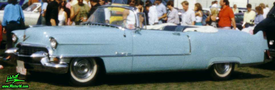 Photo of a turquoise 1955 Cadillac Series 62 Convertible at a classic car meeting in K�ln Chorweiler (Cologne), Germany. 1955 Caddy