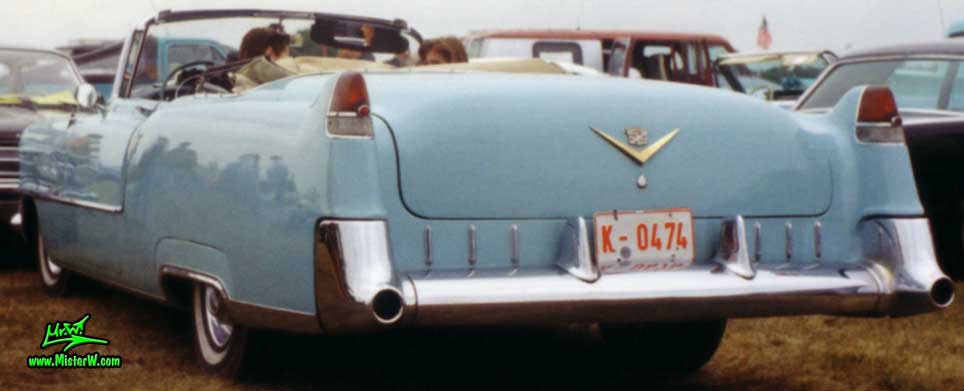 Photo of a turquoise 1955 Cadillac Series 62 Convertible at a classic car meeting in K�ln Chorweiler (Cologne), Germany. 55 Cadillac Convertible