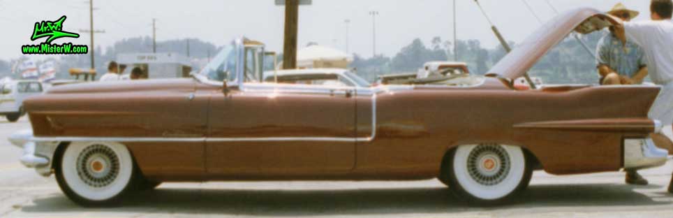 Photo of a gold brown 1955 Cadillac Eldorado Convertible at the Pomona Classic Car Swap Meet in Los Angeles, California. 1955 Cadillac Eldorado Convertible at the Pomona Classic Car Swap