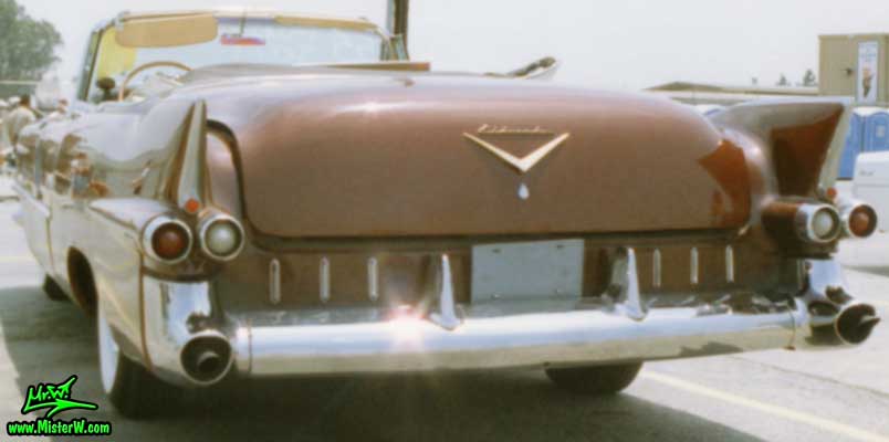 Photo of a gold brown 1955 Cadillac Eldorado Convertible at the Pomona Classic Car Swap Meet in Los Angeles, California. 1955 Cadillac Eldorado in California