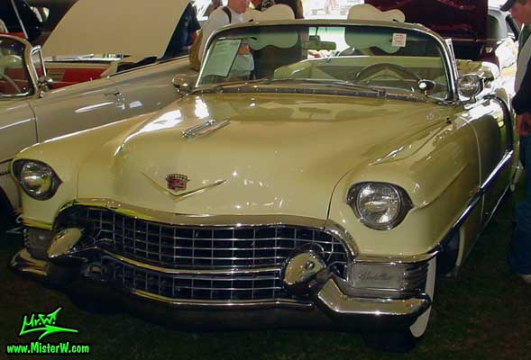 Photo of a white 1955 Cadillac Eldorado Convertible at a classic car auction in Scottsdale, Arizona. 1955 Cadillac Eldorado at a classic car auction in Scottsdale, Arizona
