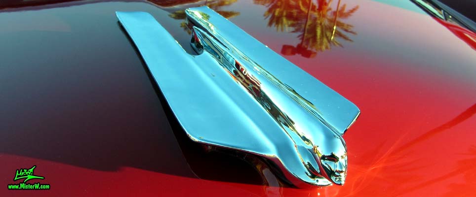 Photo of a red 1955 Cadillac Eldorado Convertible at the Scottsdale Pavilions Classic Car Show in Arizona. 55 Cadillac Eldorado Hood Ornament