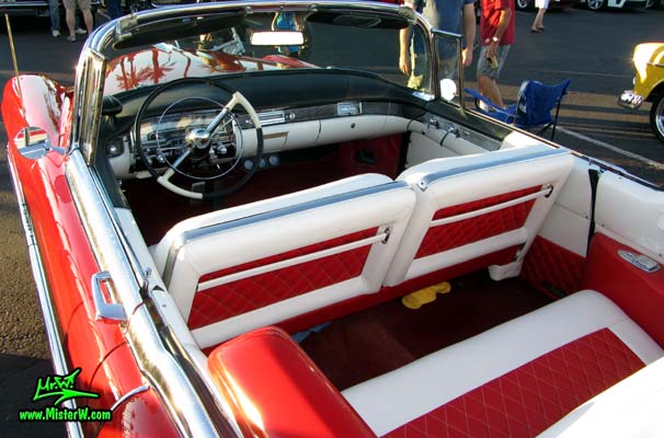 Photo of a red 1955 Cadillac Eldorado Convertible at the Scottsdale Pavilions Classic Car Show in Arizona. 55 Cadillac Eldorado Convertible Dashboard & Interior