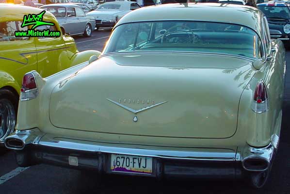 Photo of a jade 1956 Cadillac Sedan 4 Door Hardtop at the Scottsdale Pavilions Classic Car Show in Arizona. 1956 Cadillac Sedan Tail Fins