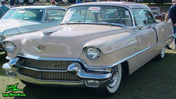 Photo of a pink 1956 Cadillac Coupe 2 Door Hardtop at a Classic Car auction in Scottsdale, Arizona. 1956 Cadillac Coupe