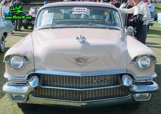 Photo of a pink 1956 Cadillac Coupe 2 Door Hardtop at a Classic Car auction in Scottsdale, Arizona. 1956 Cadillac at a classic car auction in Scottsdale, Arizona