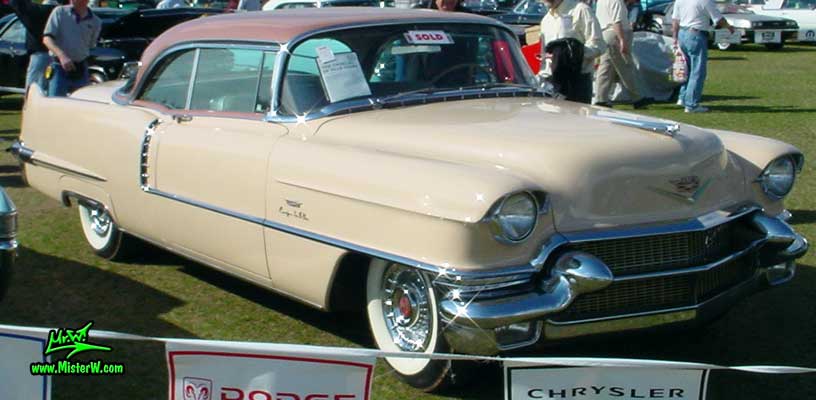 Photo of a pink 1956 Cadillac Coupe 2 Door Hardtop at a Classic Car auction in Scottsdale, Arizona. 1956 Cadillac Hardtop Coupe