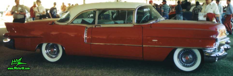 Photo of a red 1956 Cadillac Eldorado SeVille Coupe 2 Door Hardtop at a Classic Car auction in Scottsdale, Arizona. 1956 Caddy Eldorado SeVille