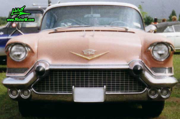 Photo of a pink 1957 Cadillac Coupe 2 Door Hardtop at a classic car meeting in K�ln Chorweiler (Cologne), Germany. 1957 Cadillac Coupe