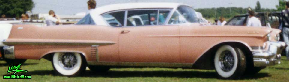 Photo of a pink 1957 Cadillac Coupe 2 Door Hardtop at a classic car meeting in K�ln Chorweiler (Cologne), Germany. Pink & White 1957 Cadillac Coupe