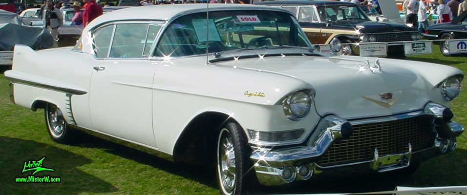 Photo of a white 1957 Cadillac Coupe 2 Door Hardtop at a classic car auction in Scottsdale, Arizona. White 1957 Cadillac Coupe at a classic car auction in Arizona